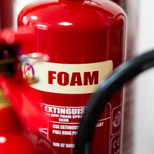 A fire extinguisher being serviced