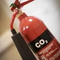 A black CO2 fire extinguisher, suitable for Class B and Class E fires