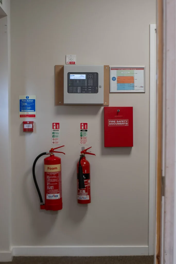 A fire extinguisher in a workplace