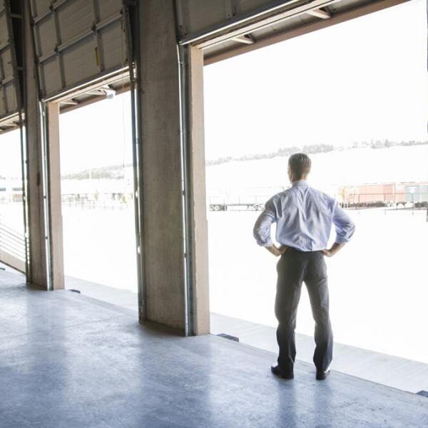 A man standing in a loading dock