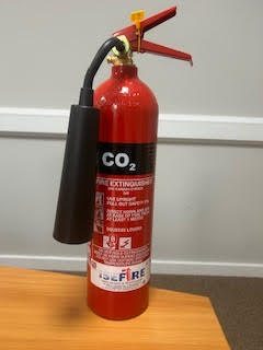 Black CO2 fire extinguisher for Class B and Class E fires — fire extinguisher supply and servicing from Fire Alarm Systems